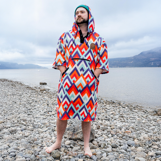 changing poncho on beach